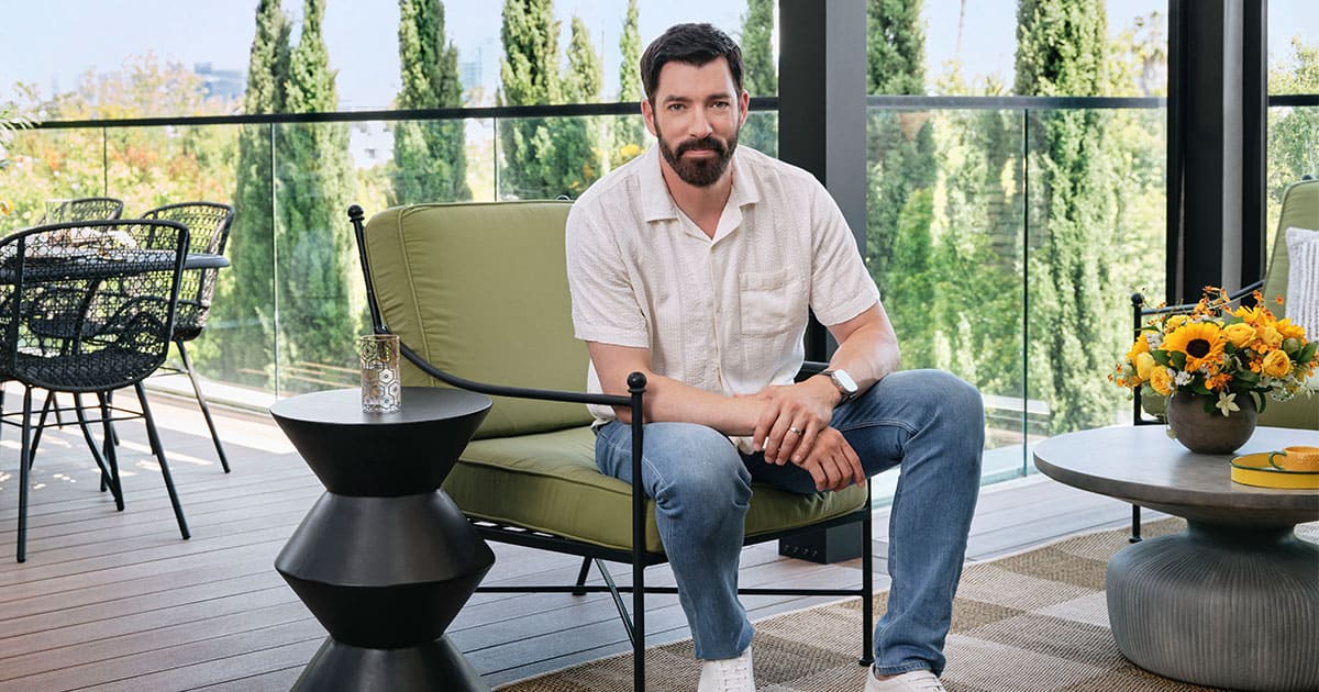drew scott on his outdoor roof deck