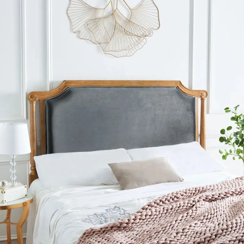 gray upholstered headboard with wood detailing