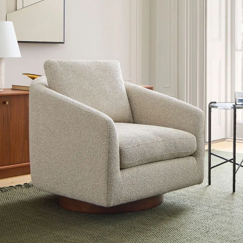 sand-colored boucle swivel accent chair