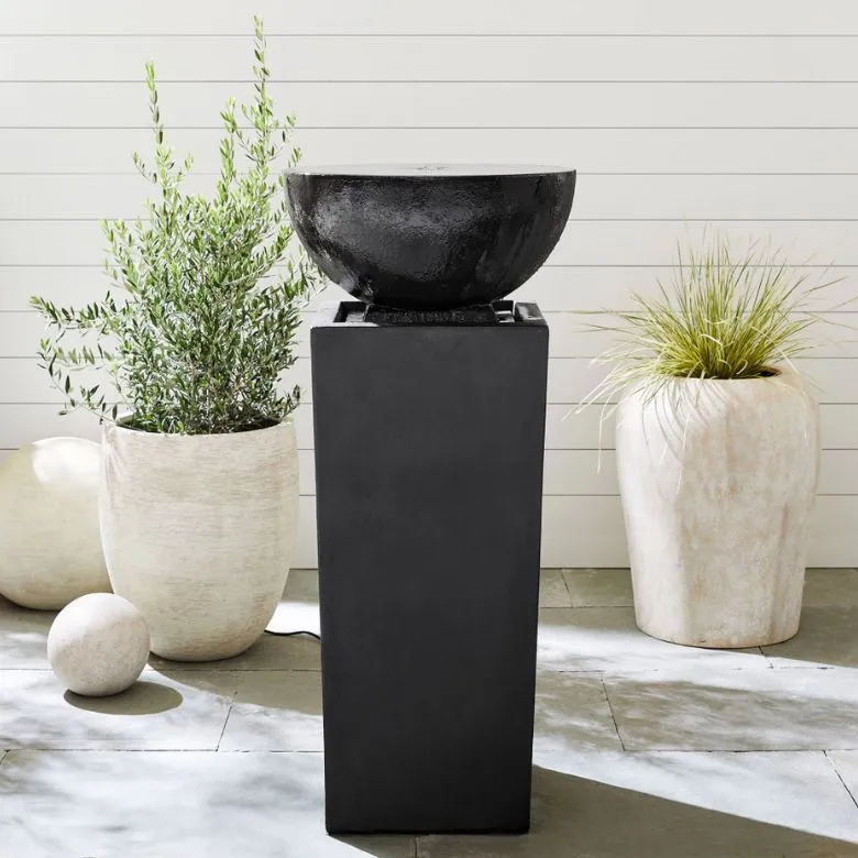 tall black pedestal fountain