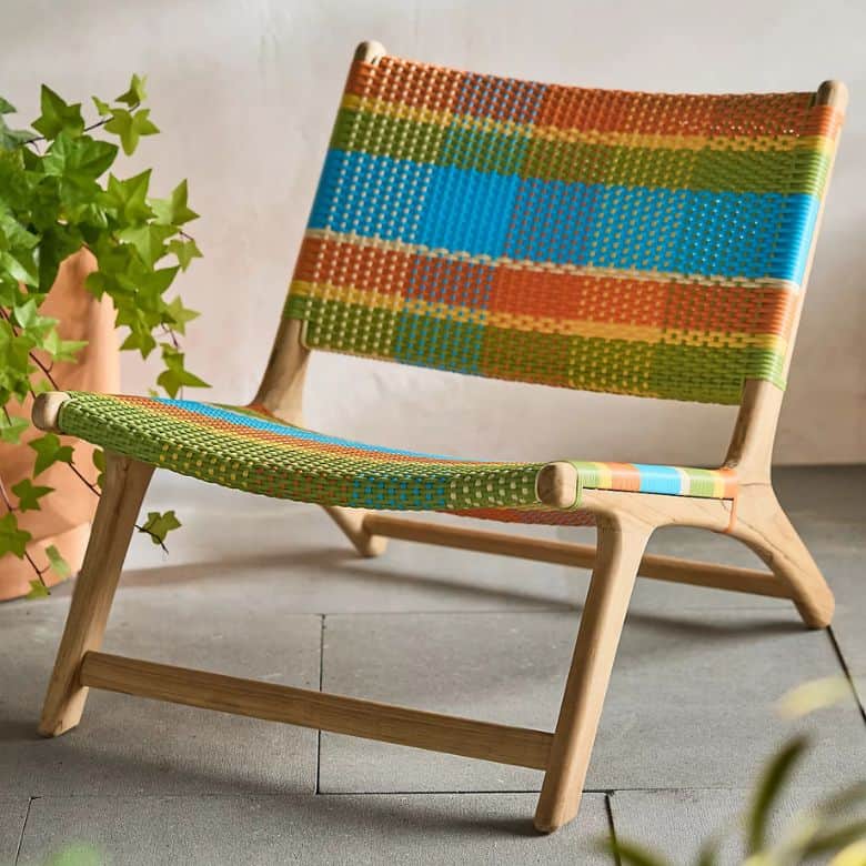multi-colored outdoor wicker and teak lounge chair