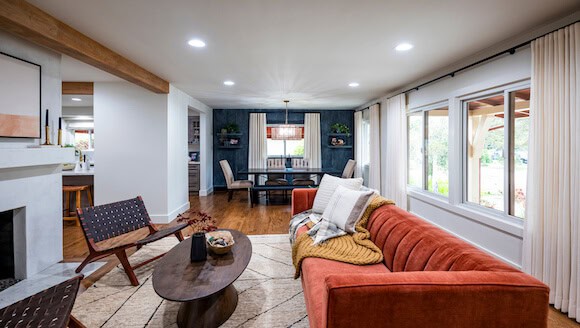 Rust colored couch in living room